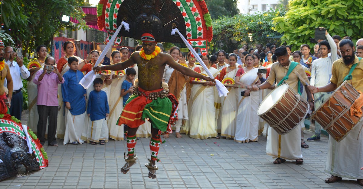 Visiting villages in Kerala - Traditional dance performer Kerala India