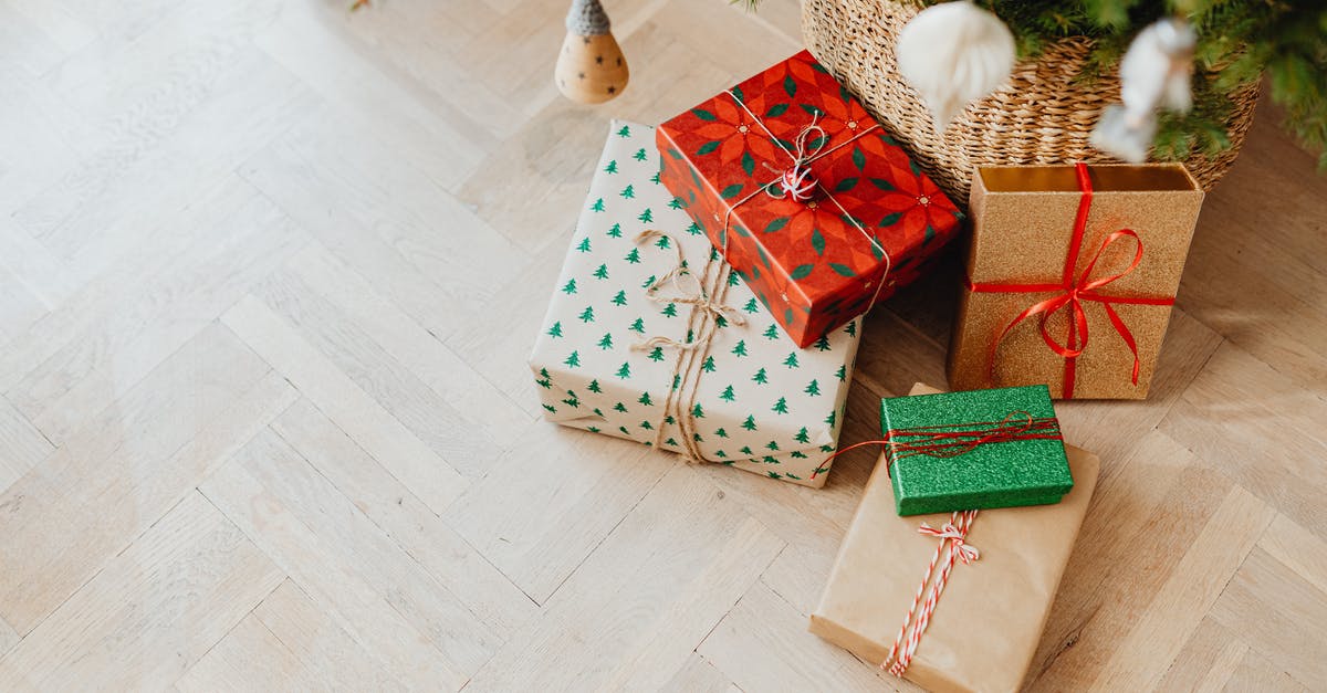 Visitor Visa for 2 Years [closed] - Red and White Polka Dot Gift Box Beside Green Christmas Tree