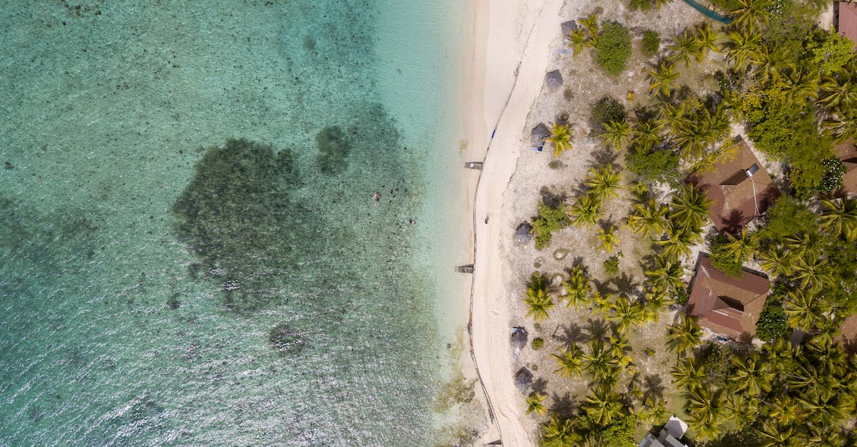 Voluntourism in Fiji - Aerial View Of Beach And Huts