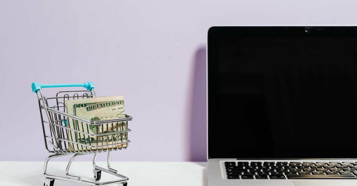 Vueling hand bag rules - Shopping Cart Next to a Laptop