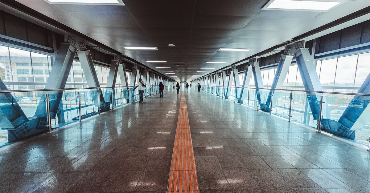 Walk from Vladivostok Airport to nearest hotel - People Walking Inside Tunnel