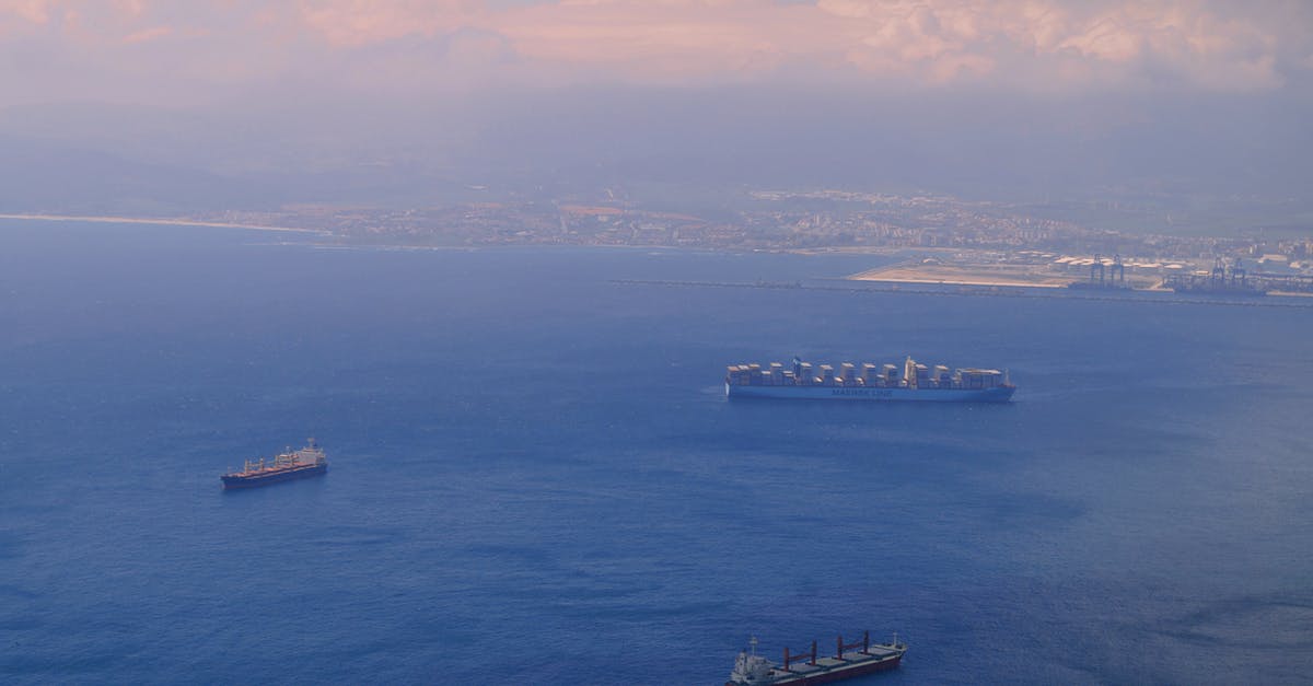 Watching container ships in SF bay area? - Aerial Shot of Ship on Body of Water