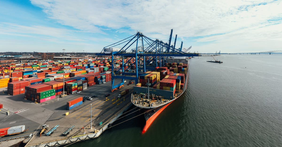 Watching container ships in SF bay area? - Cargo ship at unloading containers