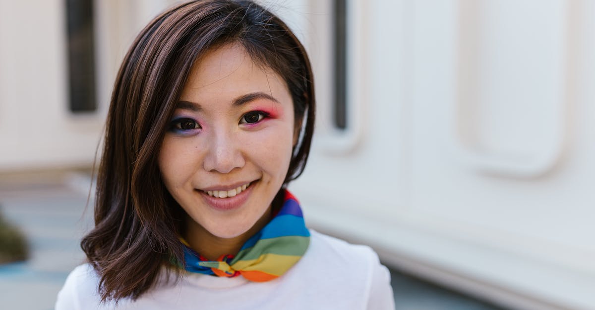 Wearing makeup in the amazon (Ecuador)? - Portrait of Woman in Makeup Wearing Rainbow Scarf Around Neck