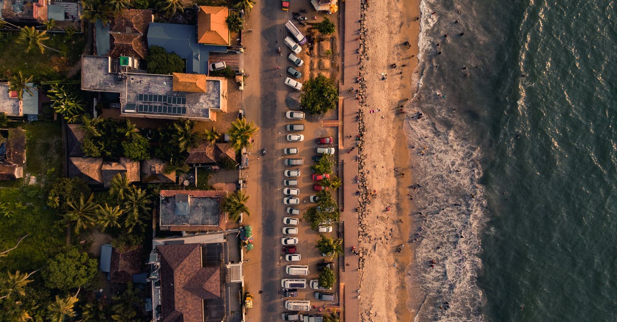 Weekend parking at PATCO stations - Beach of tropical town from drone