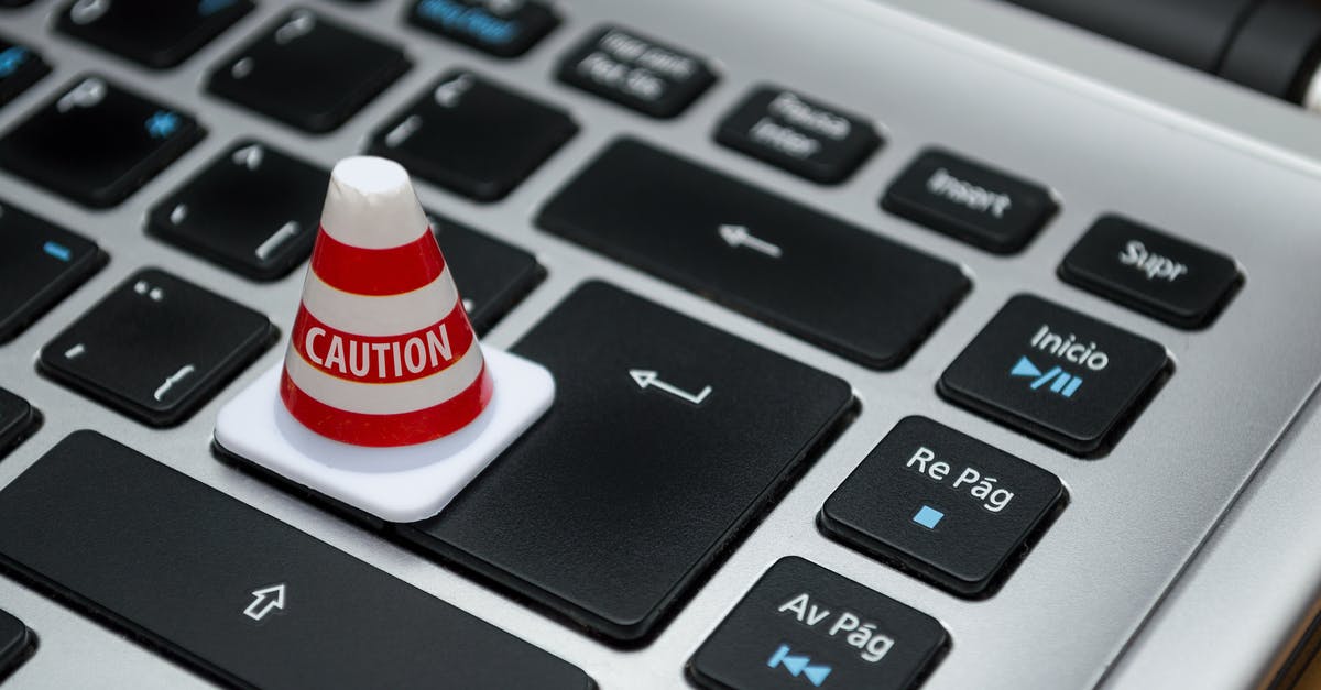 What's a "Redress Control Number"? - White Caution Cone on Keyboard