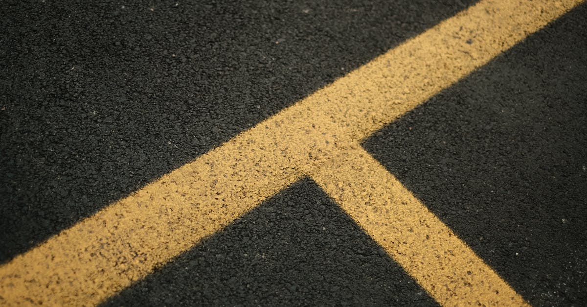 What's the cheapest way to get from Melbourne's two airports to Southern Cross Station? [duplicate] - Asphalt road with bright yellow marking lines