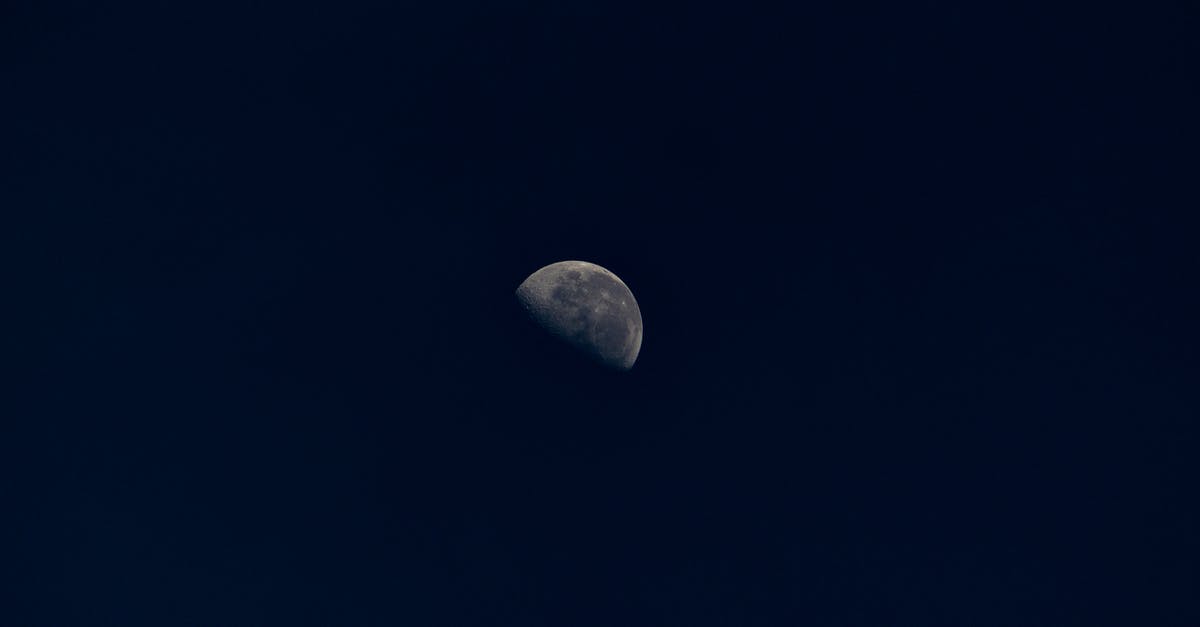 What's the closest SCUBA spot to Chiang Mai? - Half moon with stains in black sky at night