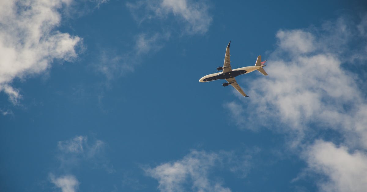 What's the difference between SkyTeam and Flying Blue? - Worms Eye View of Airplane Flying on Sky