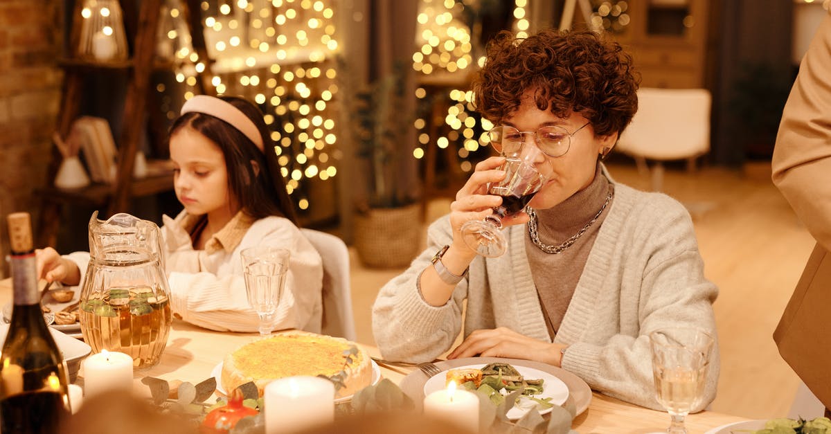 What's the drinking age in the duty free area? - Woman Drinking Her Cola