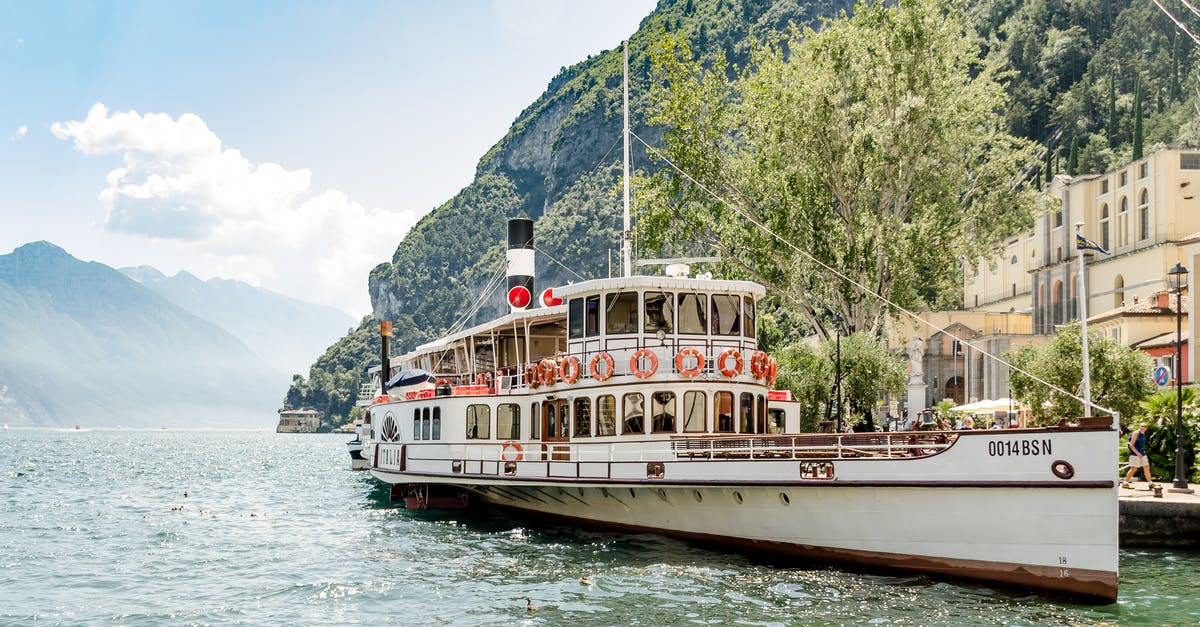 What's the fastest ferry to get from Italy to Albania? - White Ship On Body Of Water Beside Mountain