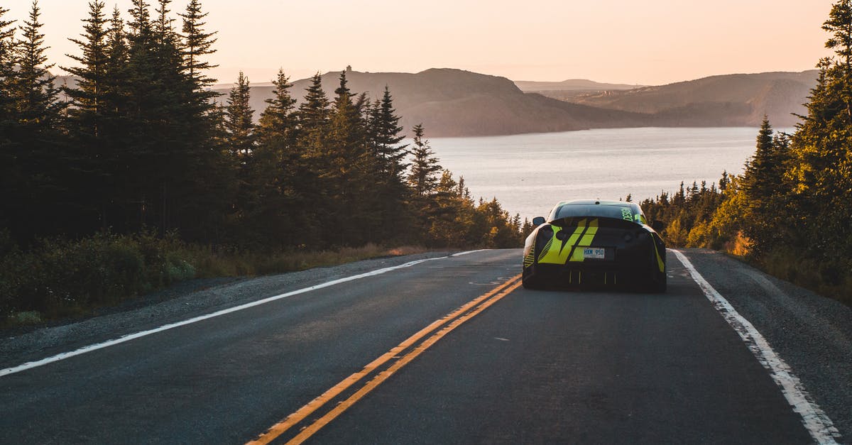 What's the longest direct route with Flixbus? - Fashionable sport car driving to sea in mountains