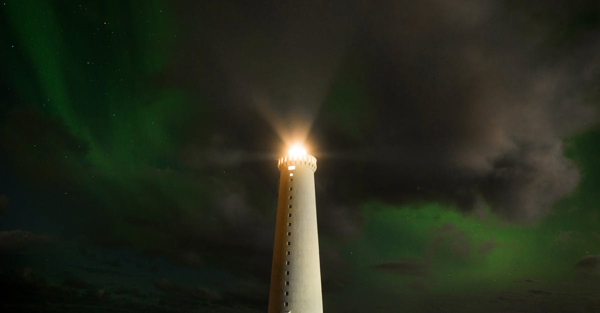 What's the most cost-effective destination for a four night trip from Berlin to a non-Schengen destination? - Lighthouse tower in cloudy night