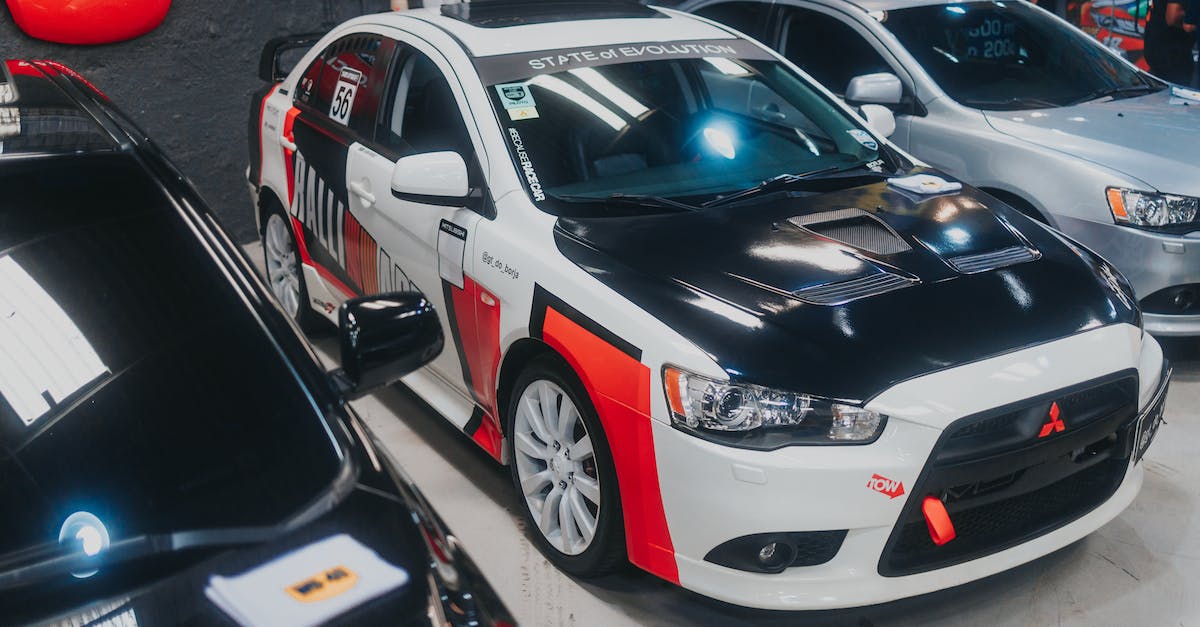 What's the name for the "blocking" stickers used on car headlights? - Mitsubishi Lancer  Evolution Parked in a Garage