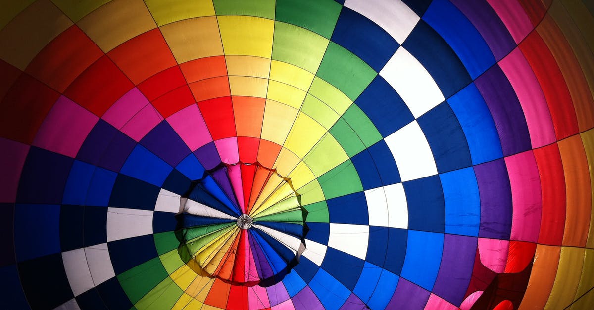 What are possible reasons for this strange flight pattern? - Top View of Multicolored Hot Air Balloon