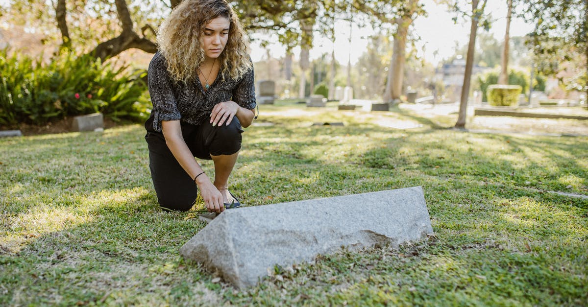 What are the actual rules for legally visiting Stull Cemetery? - A Woman Visiting on the Cemetery