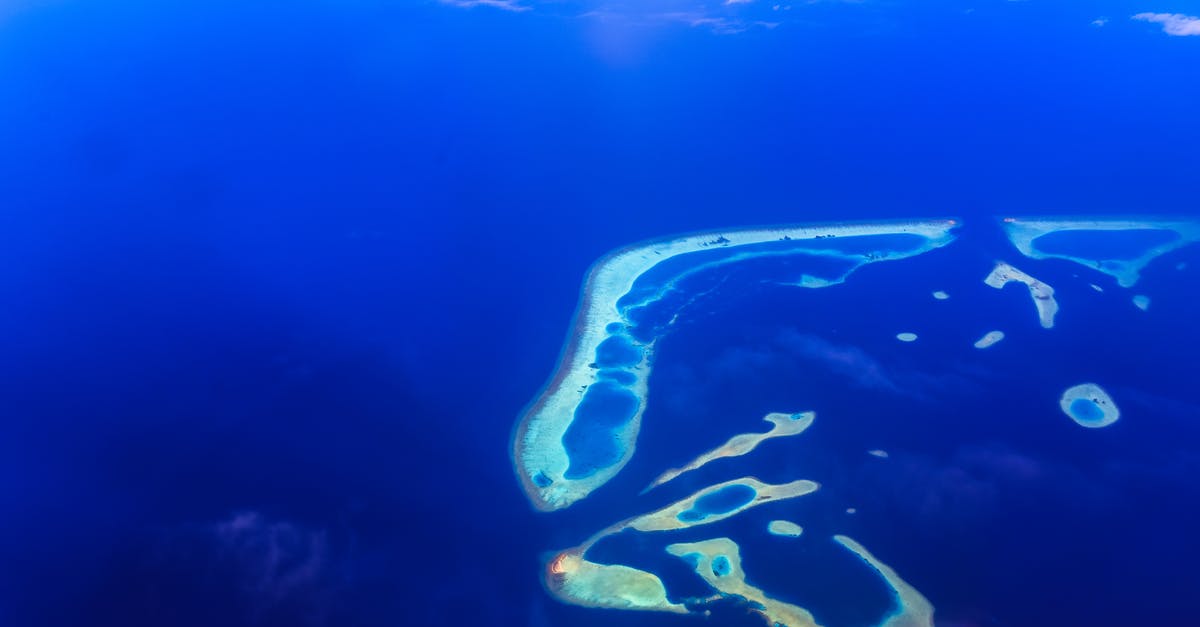 What are the current regulations to move between islands in Maldives? - Aerial Photography of Islands