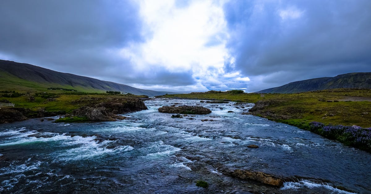 What are the current travel restrictions in Vietnam? - Water Stream Under Grey Clouds