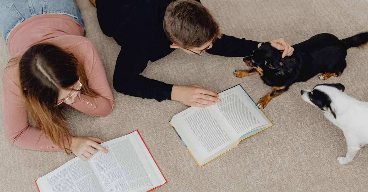 What are the English laws on bringing pets into the country? - Teenagers Lying on Floor and Reading