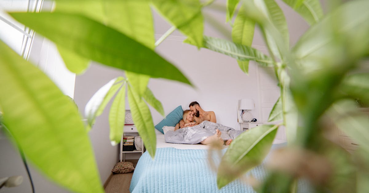 What are the hidden fees of a cruise? - Woman in White Dress Lying on Bed