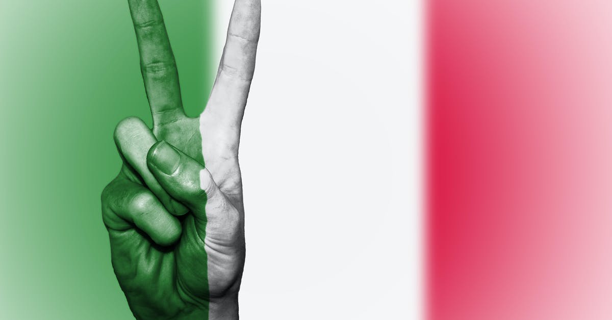 What are the options for a non-EU national who wants to stay in Italy for more than 90 days? - Person's Hand Doing Peace Sign With India Flag Backdrop