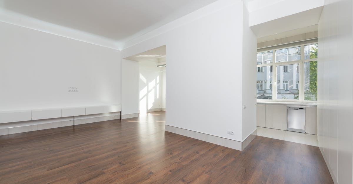 What are these white things in Stuttgart - White Wooden Cabinet on Brown Wooden Parquet Floor