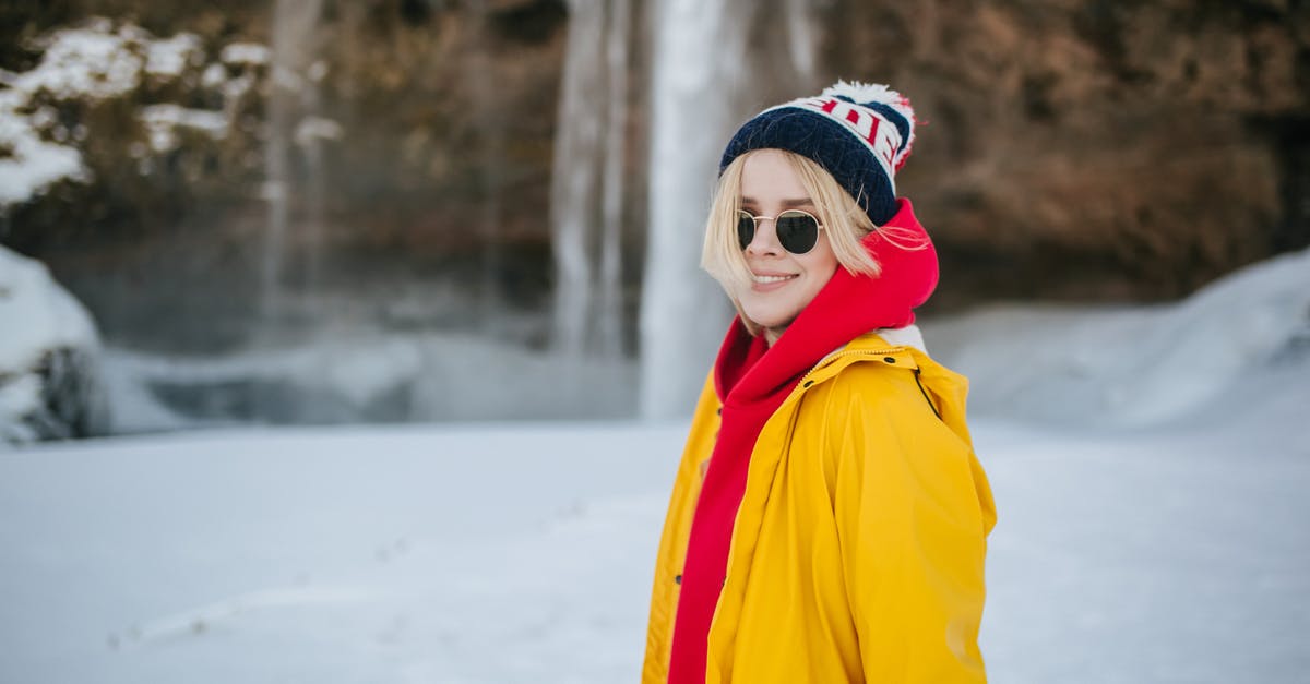 What clothes are necessary to visit Iceland in July? - A Woman Wearing Stylish Winter Clothing