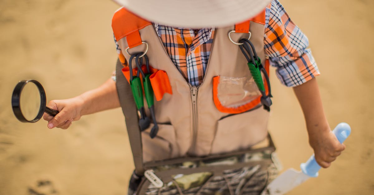 What counts as a bag and what counts as a vest? - Boy Wearing Brown and Orange Jacket