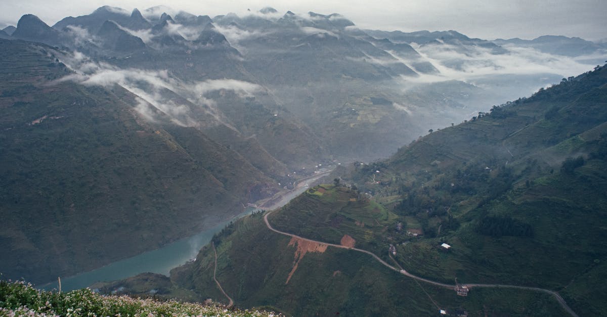 What counts as a tributary valley in Davos? - River Running Along Misty Valley in Mountains