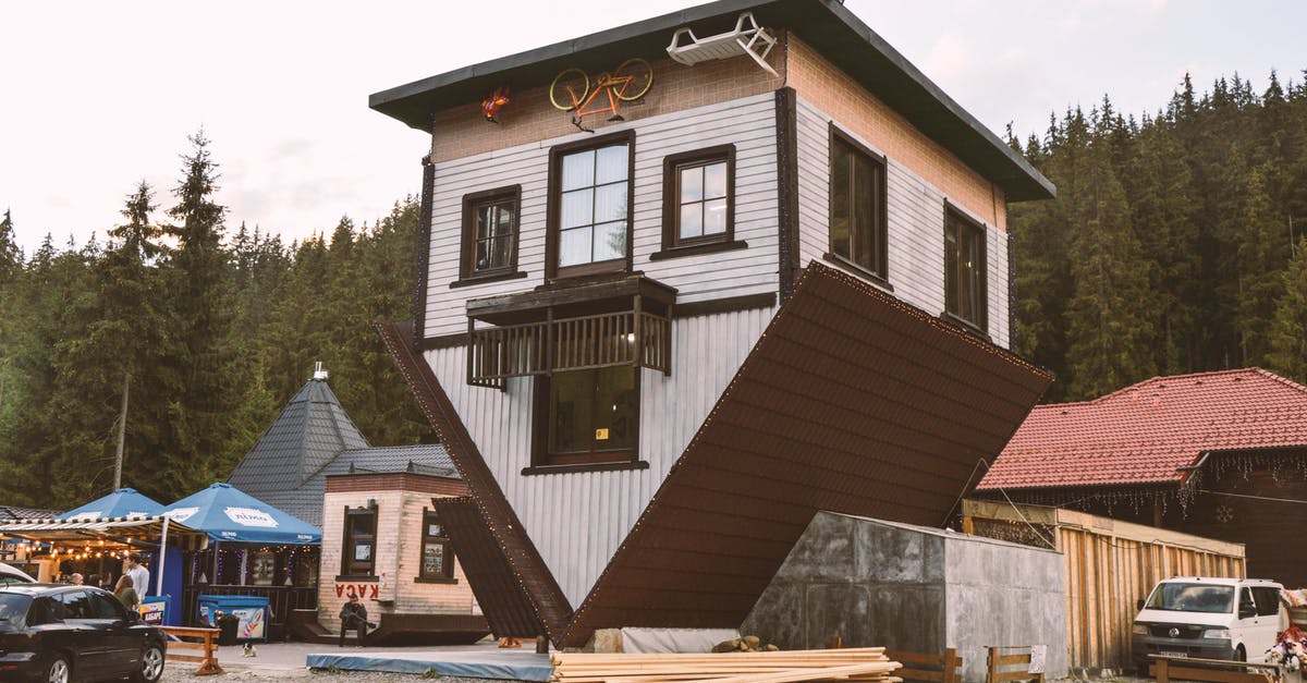 What do check-in counters know about travelers? - Brown Wooden House Near Green Trees