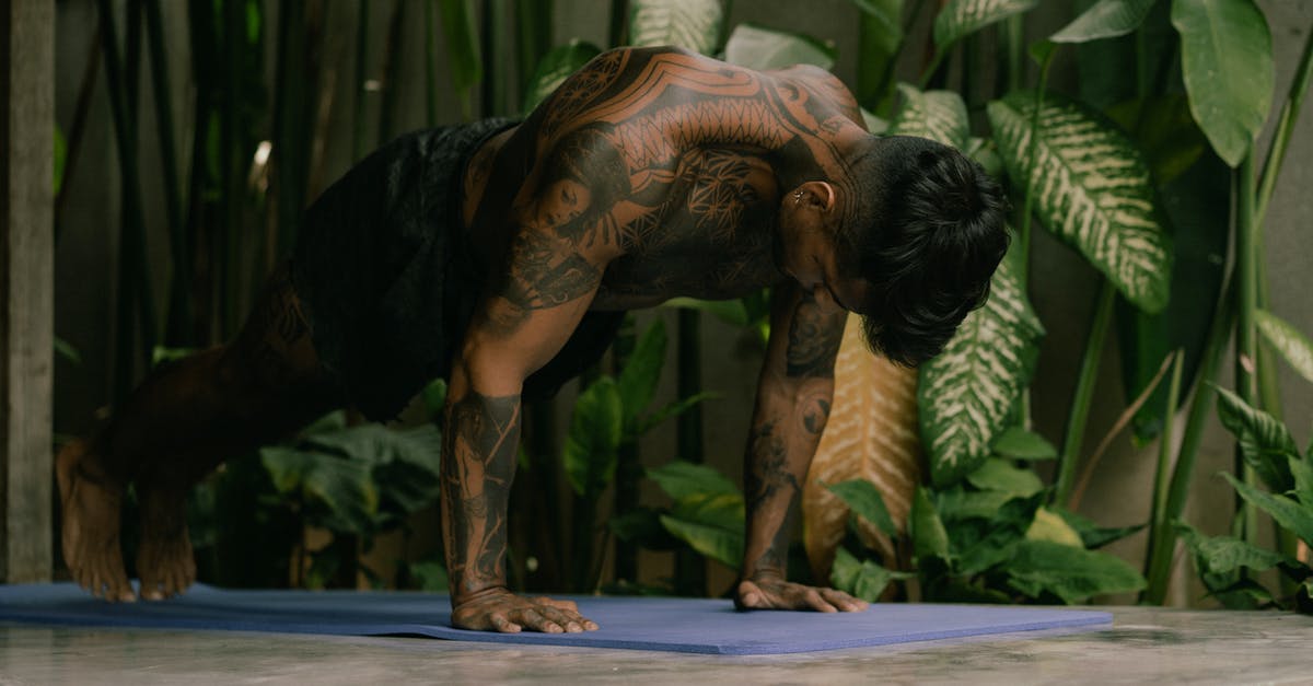 What do the Narita Airport body scanners detect? - Shirtless Man Doing Push Ups