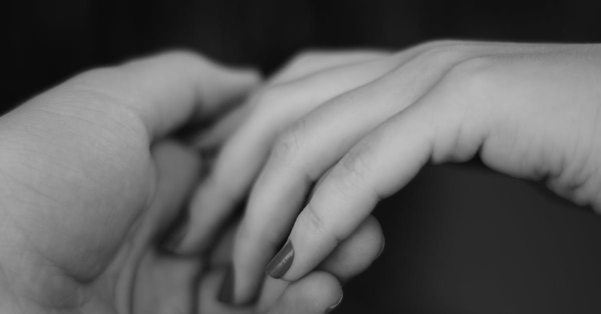 What do two fingers up mean on roads in California? - Close Up of Hands Holding