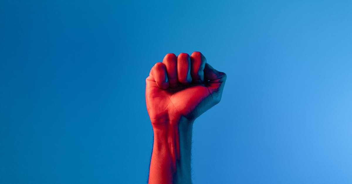 What do two fingers up mean on roads in California? - Persons Hand With Red Heart