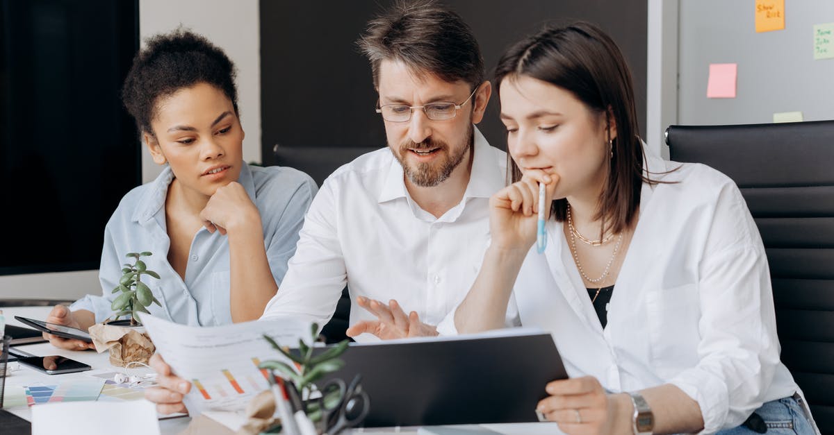 What documents do I need to obtain South African visa? - Colleagues Brainstorming Together