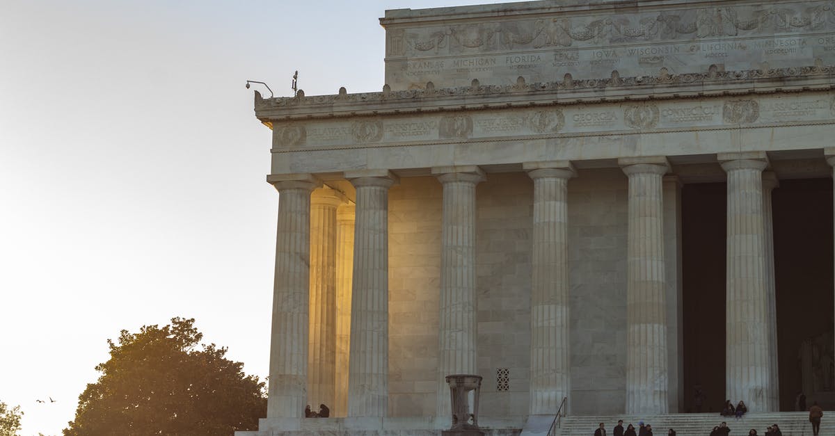 What does "MO" mean after the name of a US city? - People Walking Near Brown Concrete Building