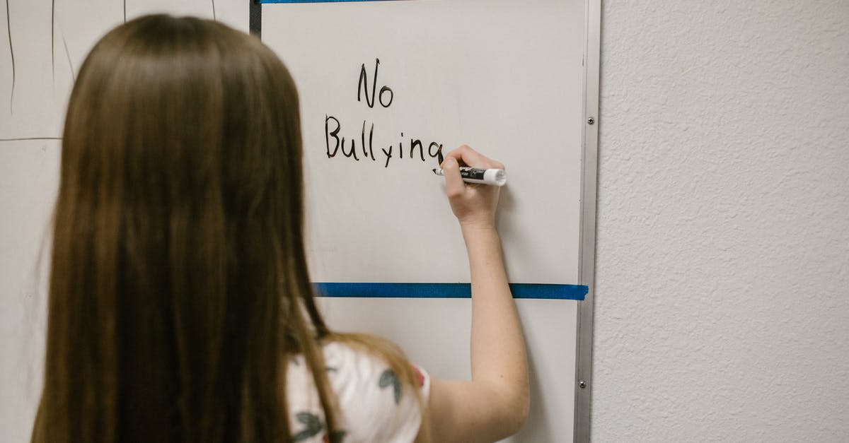 What does "OCBC Skyway" stand for? - Girl Writing a Message Against Bullying on a White Board