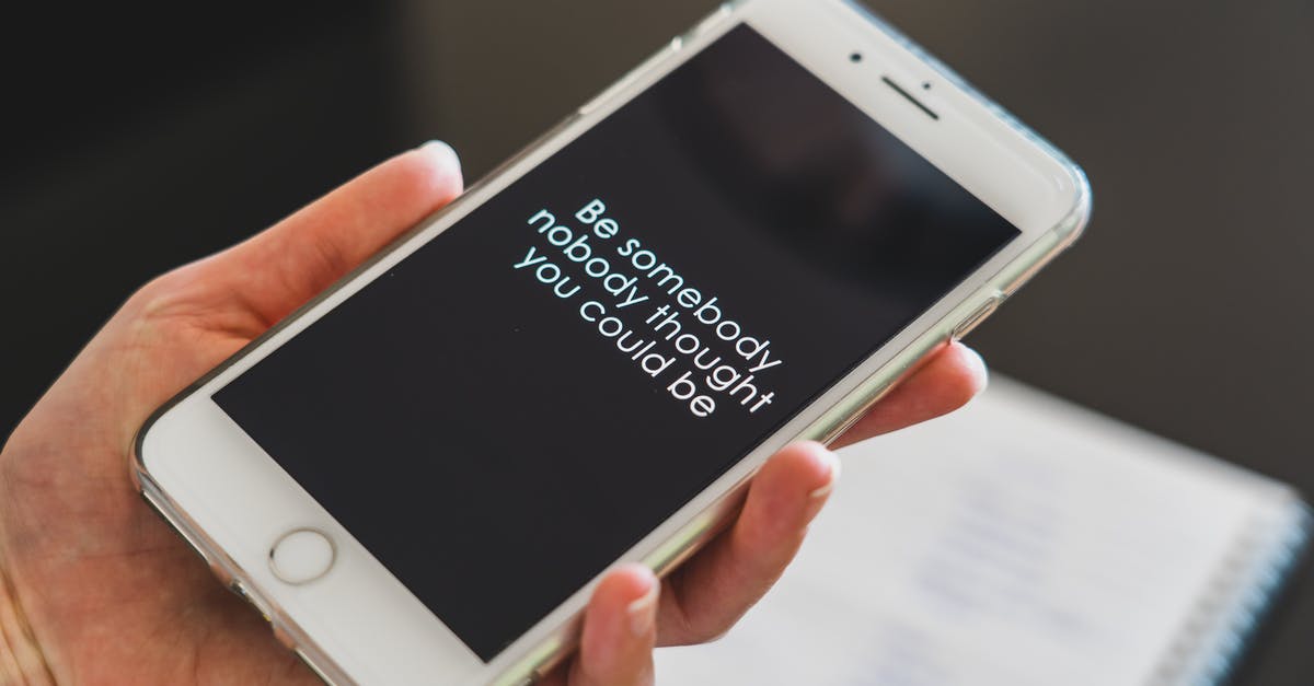 What does this mean? "Your UK visa application has been issued" - Person Holding Iphone 6 With Inspirational Quote On Display