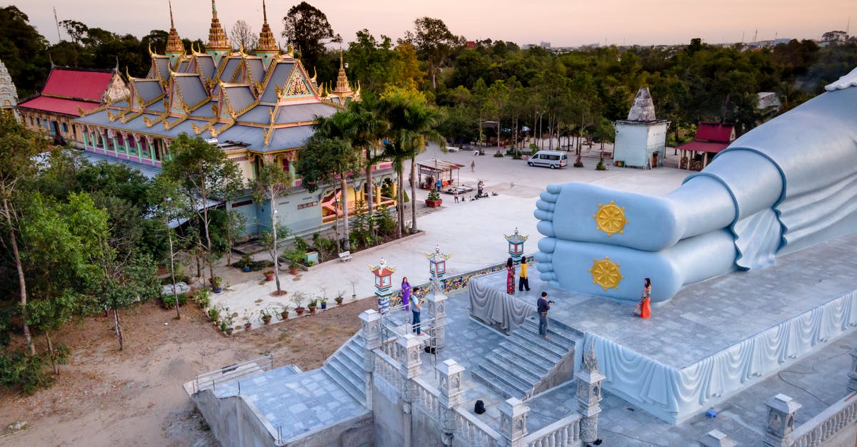 What happened to the Prime Meridian sculpture in Greenwich? - Aerial Photography of Busy Tourists in Som Rong Pagoda