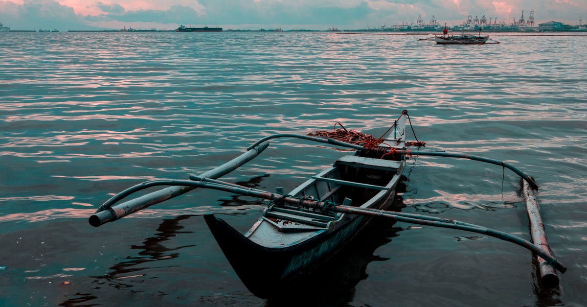 What happens if a Filipino/Australian overstays in the Philippines? - White Boat on Body of Water