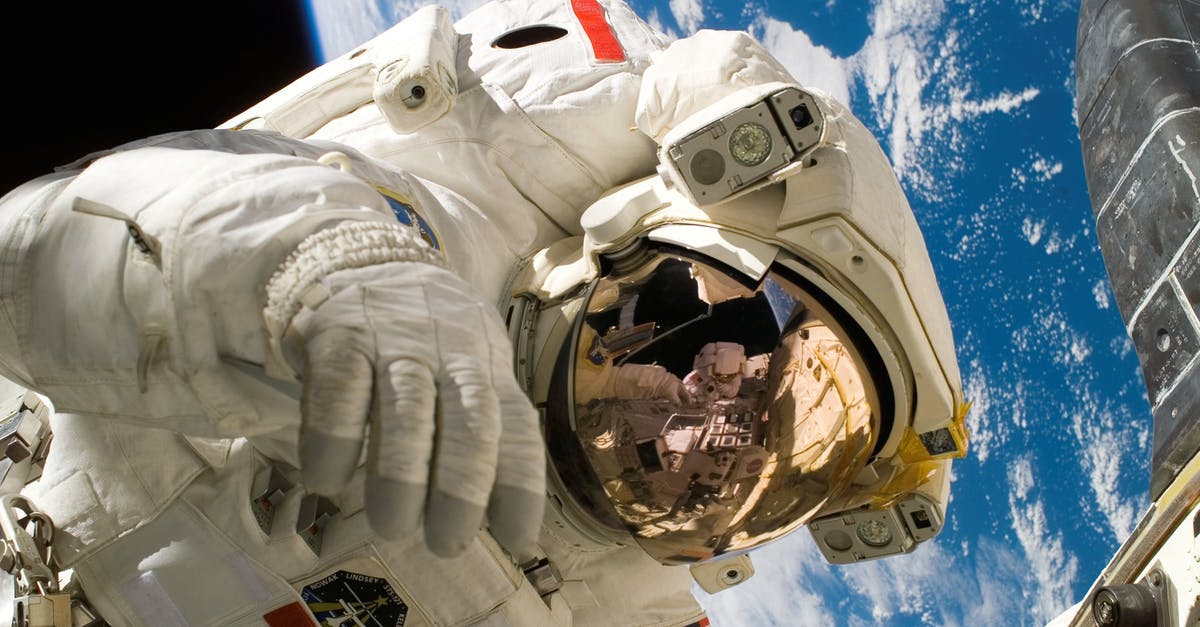 What happens if there is no space for entry stamp in the passport for US visa? - This picture shows an american astronaut in his space and extravehicular activity suite working outside of a spacecraft. In the background parts of a space shuttle are visible. In the far background of the picture planet earth with it's blue color and whi What happens if there is no space for entry stamp in the passport for US visa? - This picture shows an american astronaut in his space and extravehicular activity suite working outside of a spacecraft. In the background parts of a space shuttle are visible. In the far background of the picture planet earth with it's blue color and whi