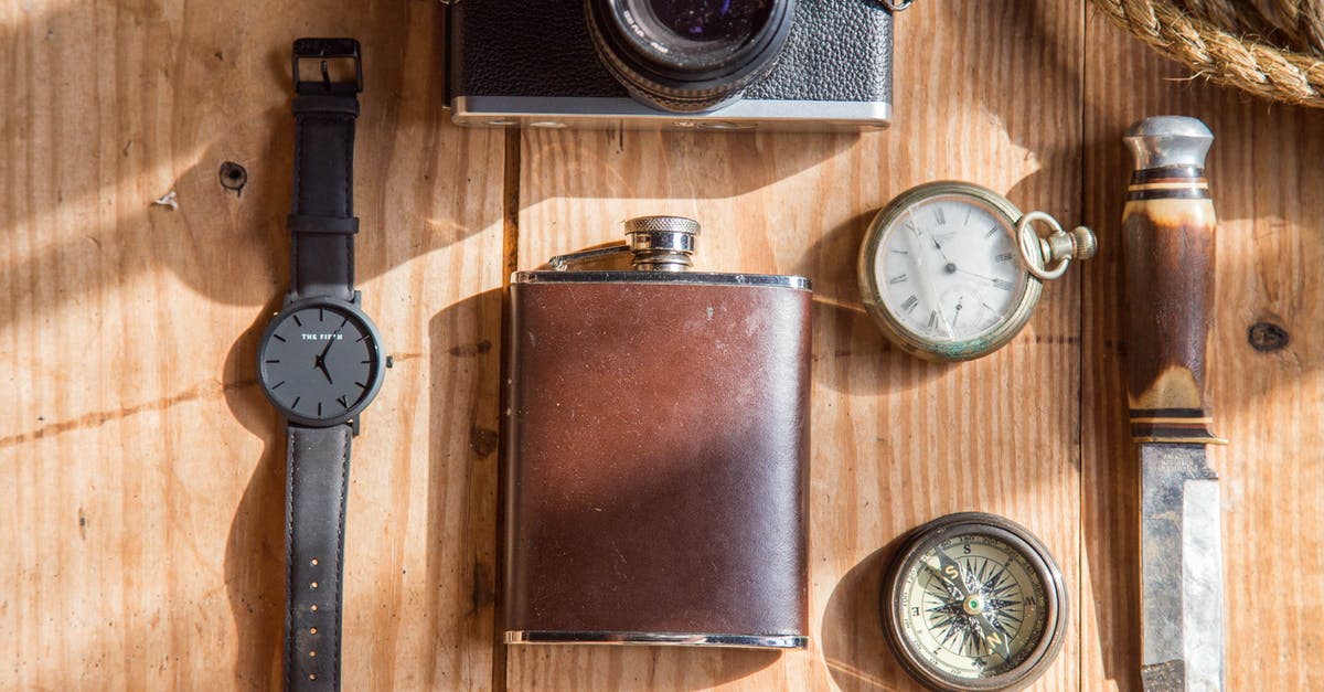 What happens if you bring a pocket knife to Europa Park? - Brown Wine Flask Near Lomo Camera Watch Knife and Pocket Watches on Able