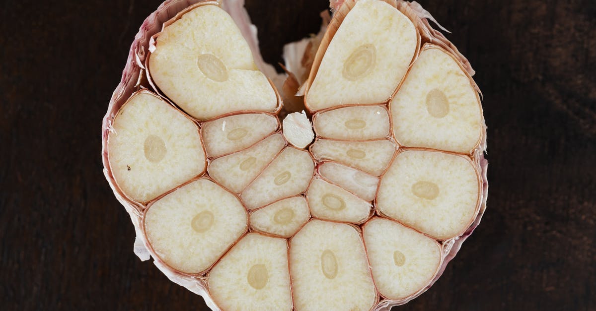 What hotels will prepare dinner as specified by the customer? [closed] - Bulb of ripe garlic in peel cut in half on wooden board