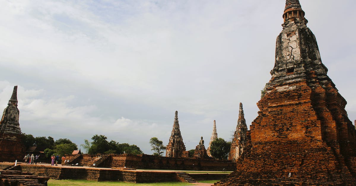 What immunisations, if any, are required / recommended for Thailand? - Brown Concrete Tower Under White Clouds