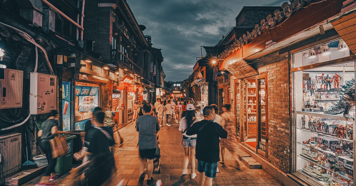 What is 1PC baggage allowance for Jetstar Asia Air? - People Walking on Street during Night Time