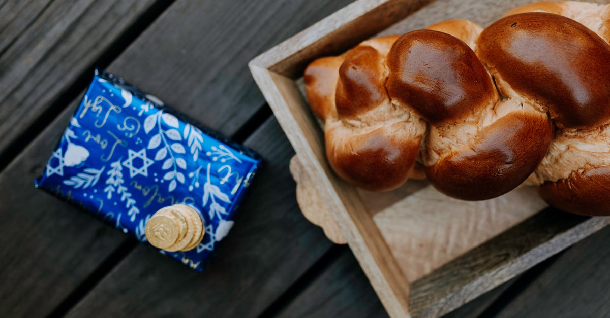 What is a good gift for hospitality in Nepal - Photo Of Bread On Wooden Tray Beside A Gift Box