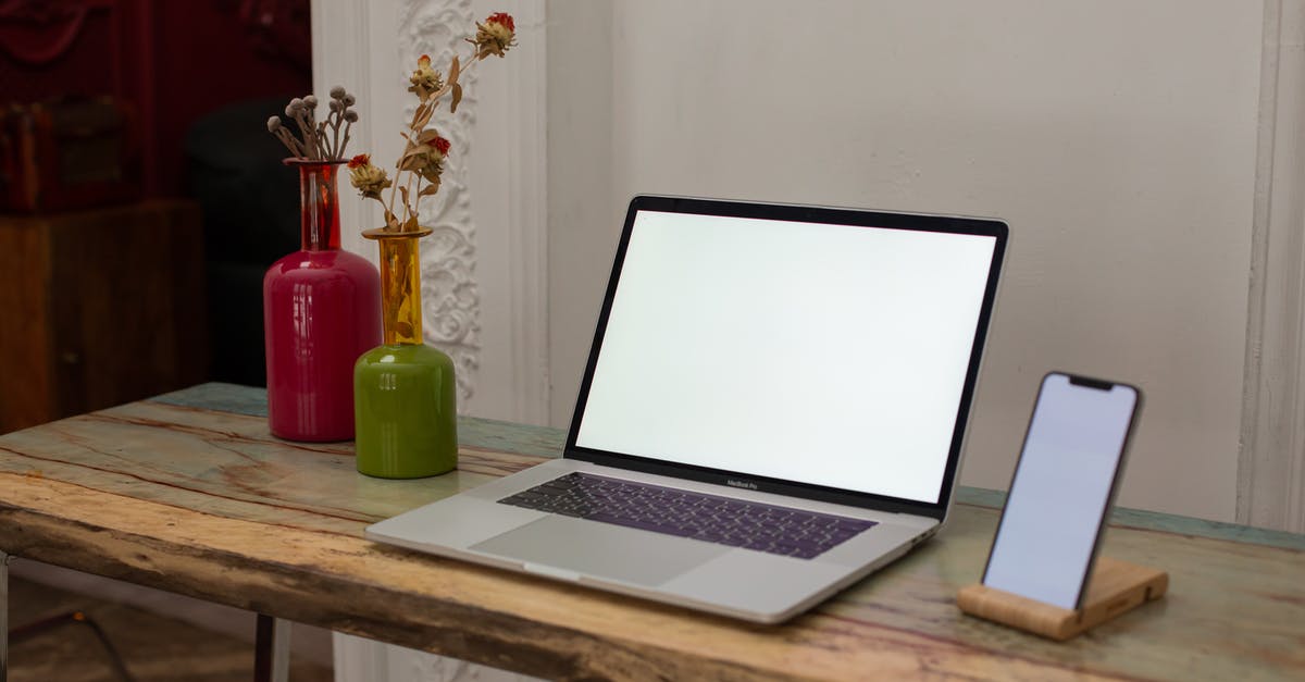 What is an open ticket? - Macbook Pro on Brown Wooden Table