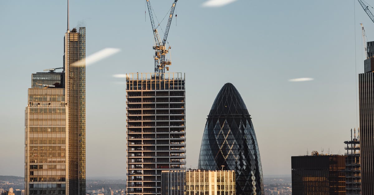 What is the closest free street parking to London city center? - Through window of modern buildings under constructions