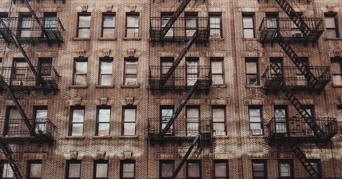 What is the location of this Windows 10 wallpaper? [duplicate] - Exterior of residential building with fire escape