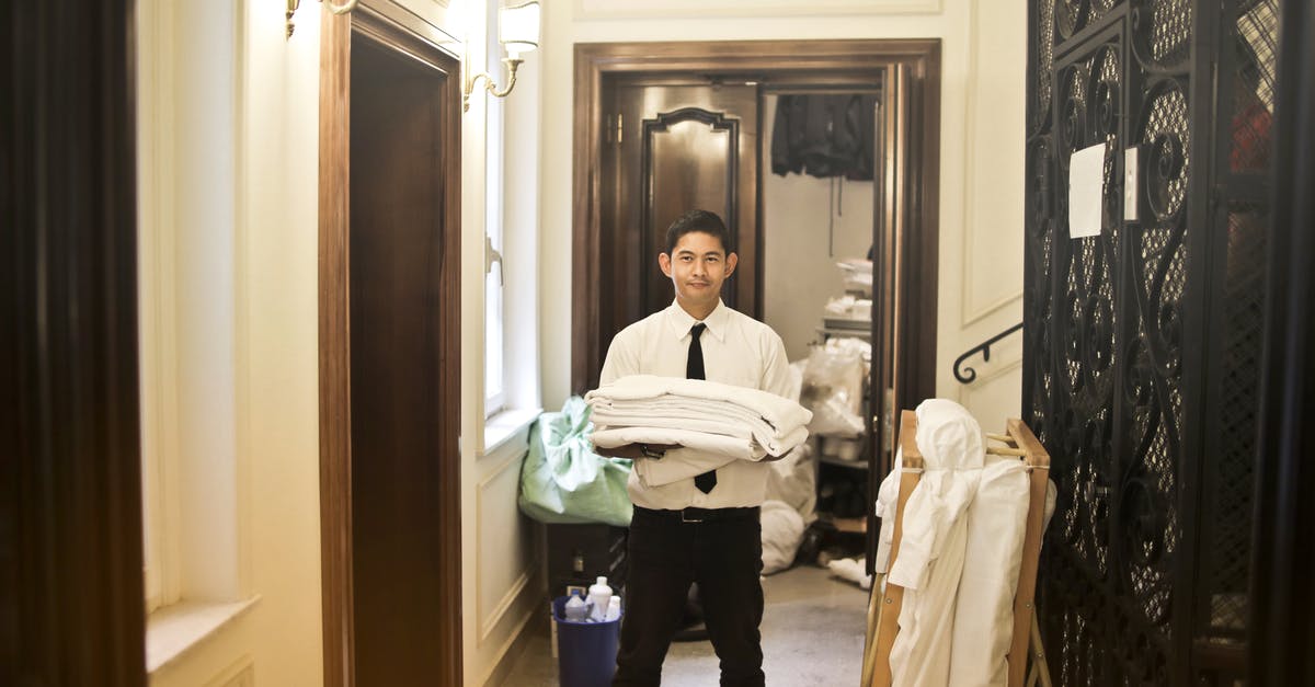 What is the purpose of this cloth in hotel? - Man in White Long sleeve