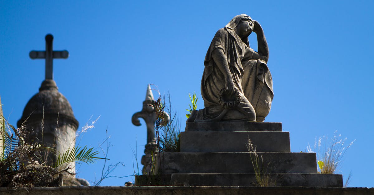 What is the quietest place with some industry? [closed] - Woman Statue Near Cross during Daytime